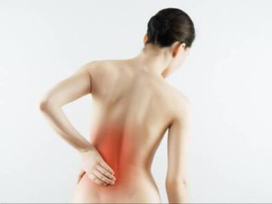 Back pain in a woman's lumbar region